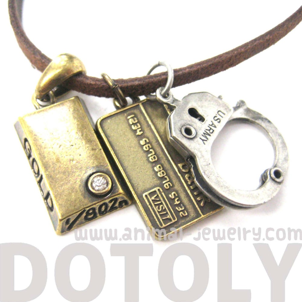 Bank Heist Themed Handcuff Gold Bar Bank Card Charm Necklace | DOTOLY | DOTOLY