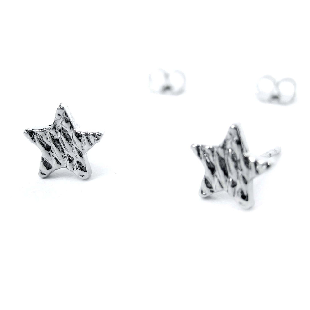 Small Star Shaped Stud Earrings with Textured Details in Silver – DOTOLY