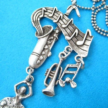 Ballerina Musical Notes and Instruments Saxophone Pendant Necklace in Silver | DOTOLY