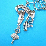 Ballerina Musical Notes and Instruments Saxophone Pendant Necklace in Silver | DOTOLY