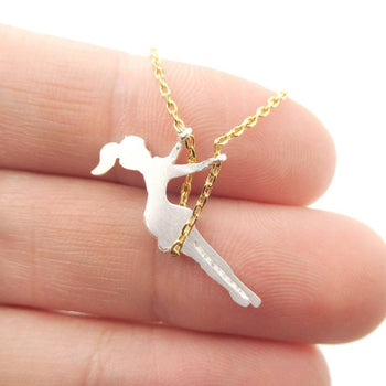 Girl Swinging on a Swing Acrobat Charm Necklace in Gold and Silver | DOTOLY | DOTOLY