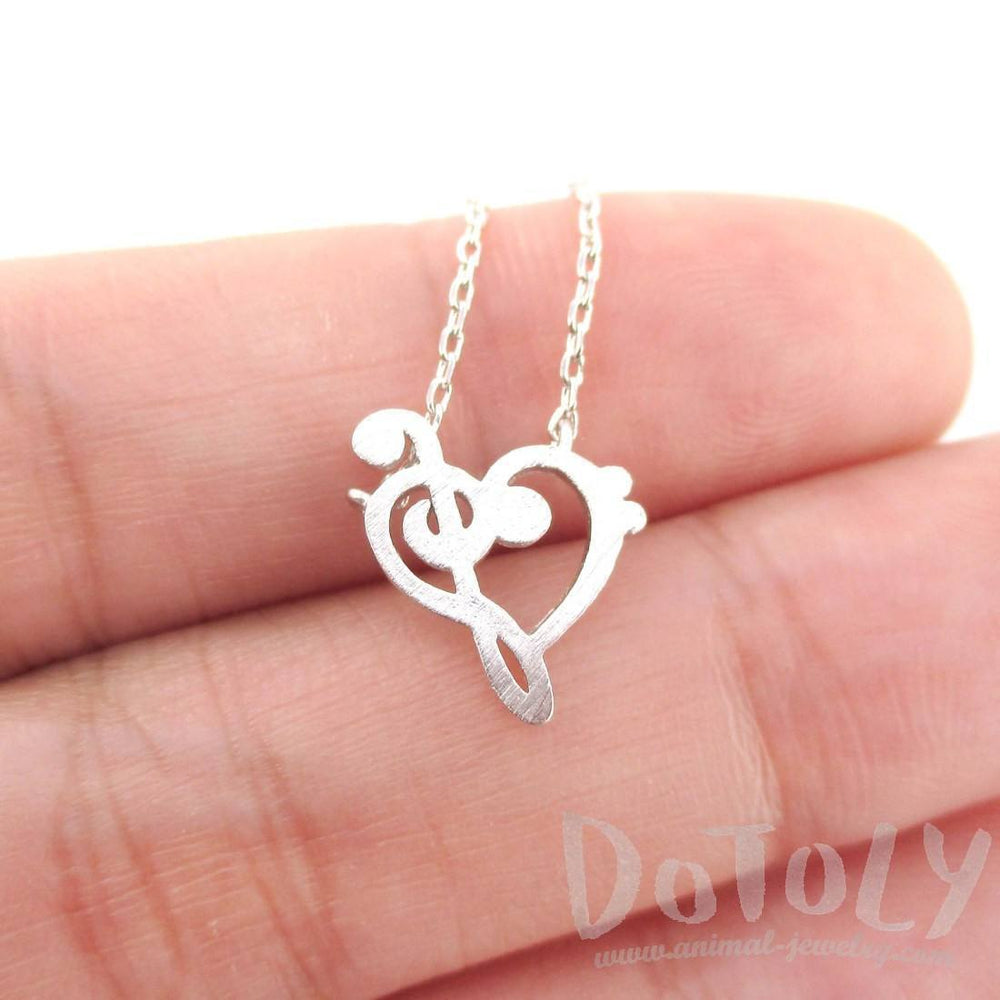 Treble and Bass Clef Heart Shaped Music Lovers Charm Necklace in Silver | DOTOLY
